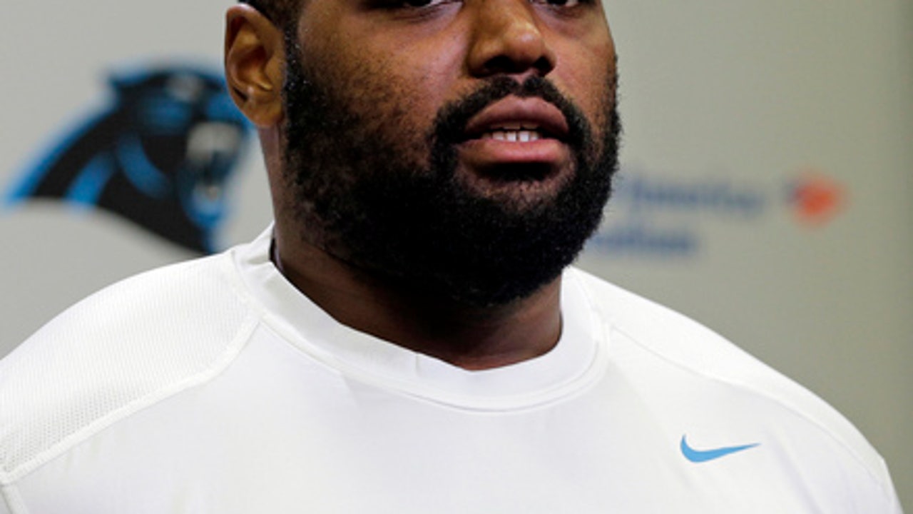 Newton doesn't throw at Panthers camp; Oher doesn't practice